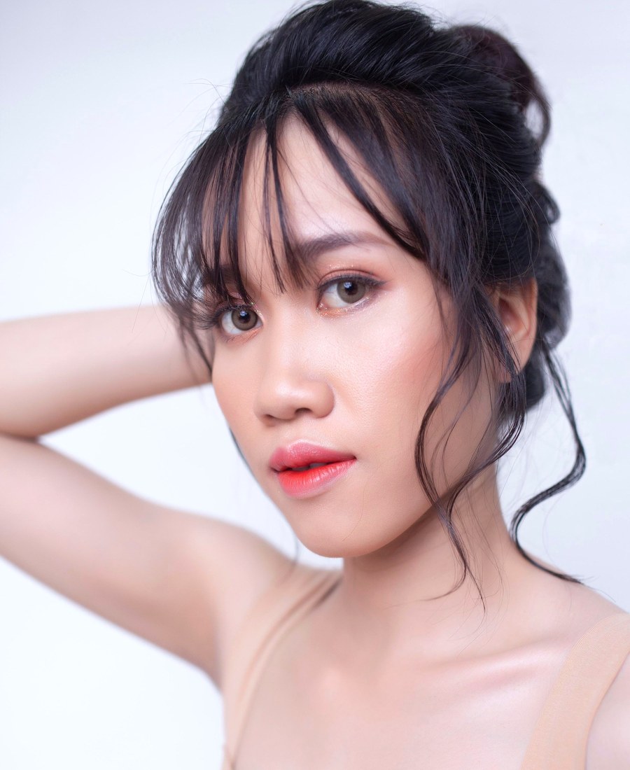 An updo styled and pinned for an occasion